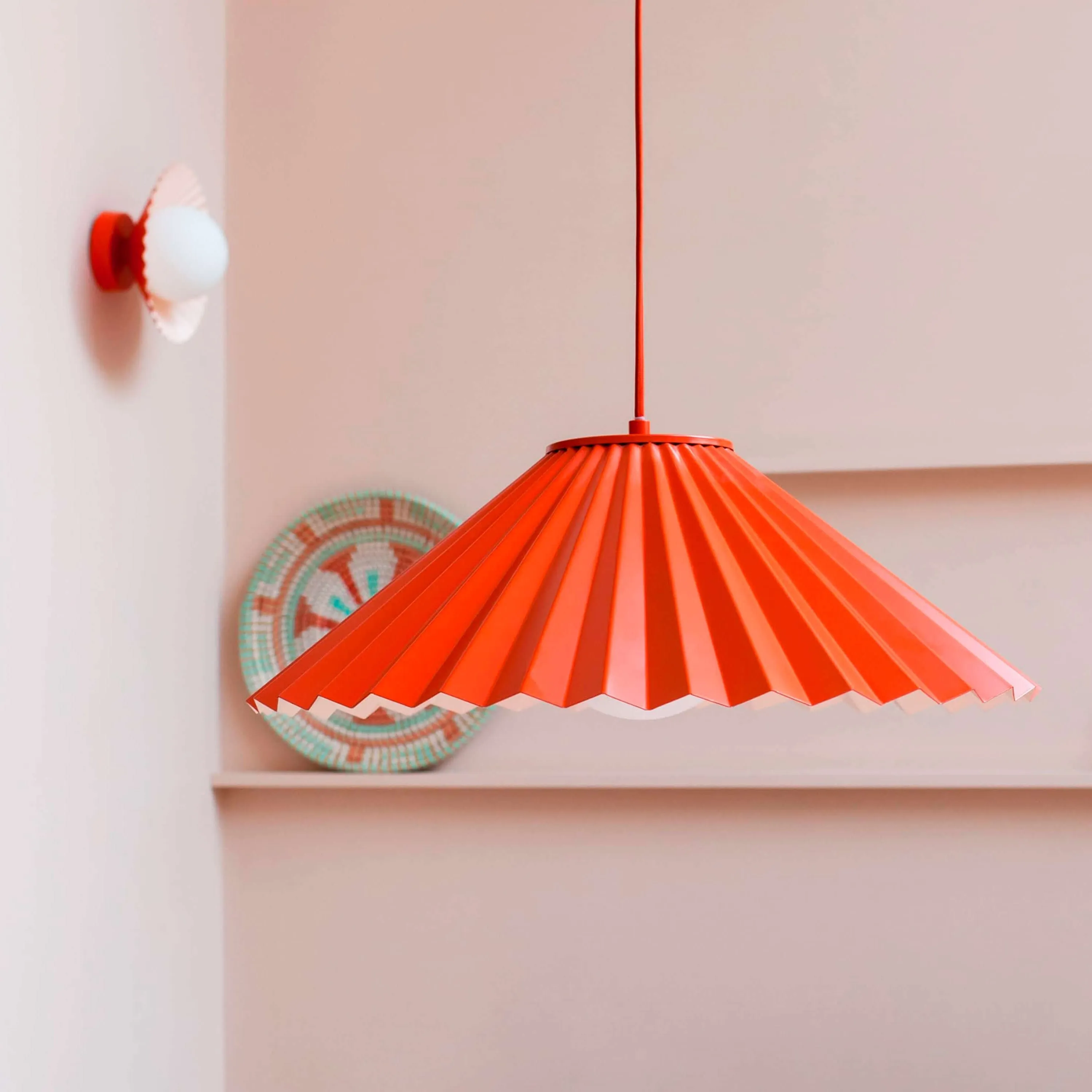 Burnt orange flush pleat wall light