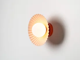 Burnt orange flush pleat wall light